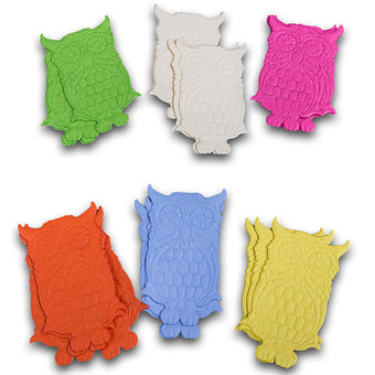 Set of colorful owl-shaped cake toppers on a white background