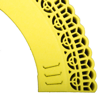 Yellow adjustable cupcake wrappers on a white background.