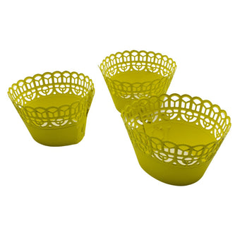Yellow adjustable cupcake wrappers on a white background.