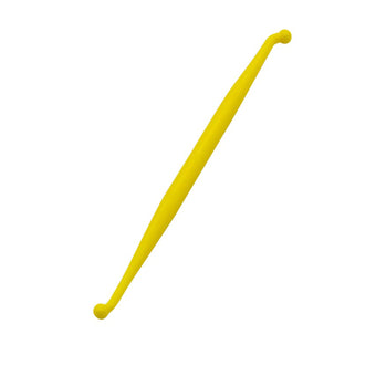 Yellow plastic fondant modelling tool on a white background