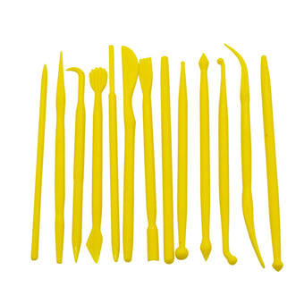 Yellow plastic fondant modelling tool on a white background